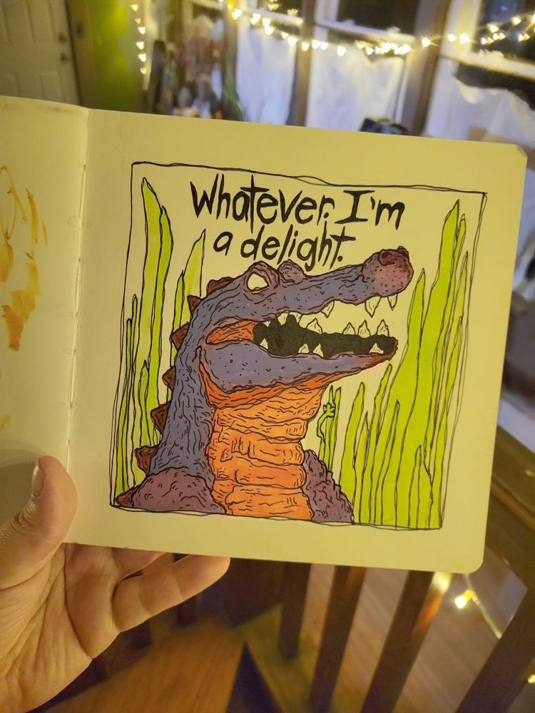 a sketchbook page of an illustrated smiling purple and orange alligator surrounded by tall green grass, with text above reading, "Whatever. I'm a delight."