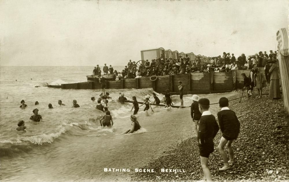 Black and white photograph as a postcard. "Bathing Scene. Bexhill." c.1910.