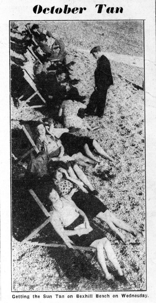 Newspaper cutting from the Bexhill Observer 13.10.1945. Sunbathers on Bexhill Beach.