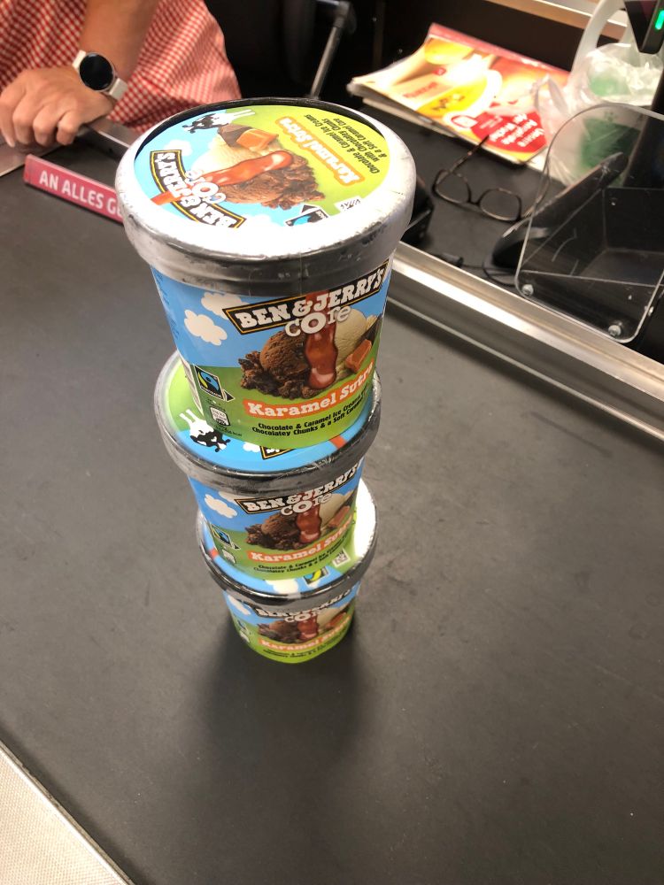 3 pints of Ben & Jerrys stacked on top of each other 