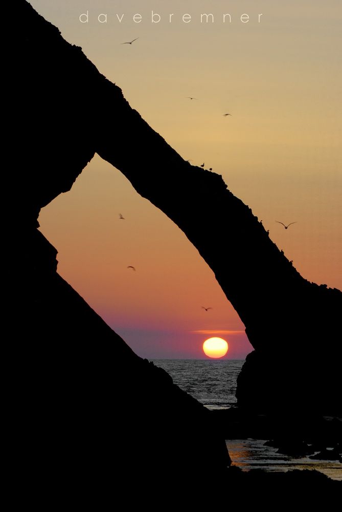 Sunrise through Bowfiddle Rosk, Scotland