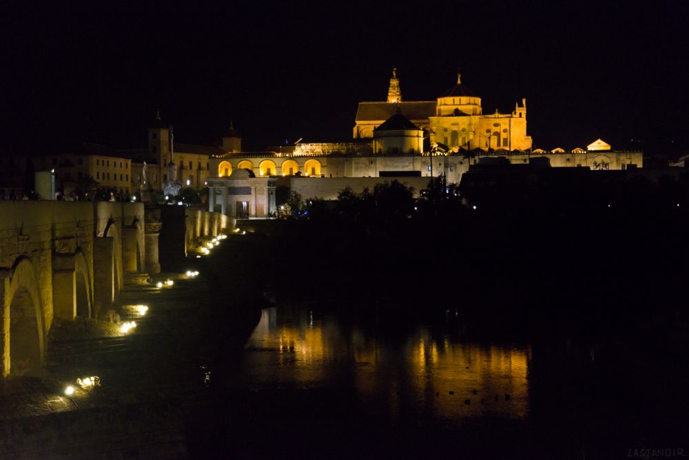A photo of Mezquita in Cordoba, Spain, made at night from across the river Guadalquivir