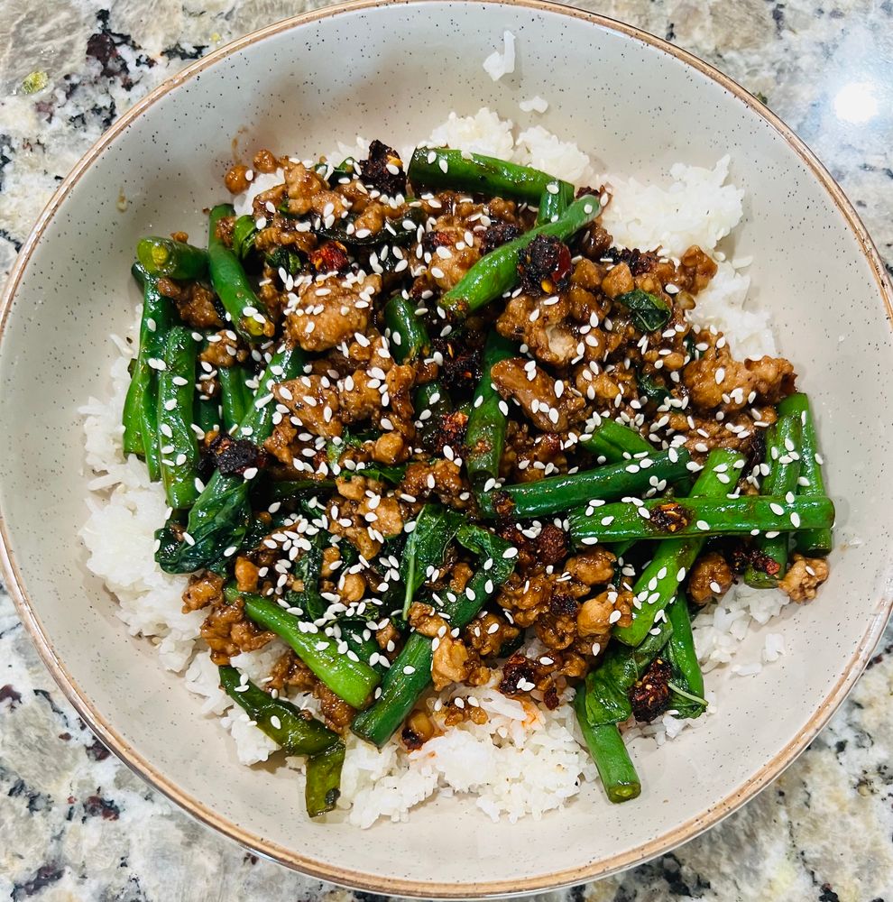 more pad kra pow over rice