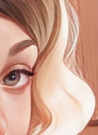 A cropped close up of irl SpicyBakerVT, she has winged eyeliner and wavy, brown hair that ombres into a pale blonde as she looks at the viewer