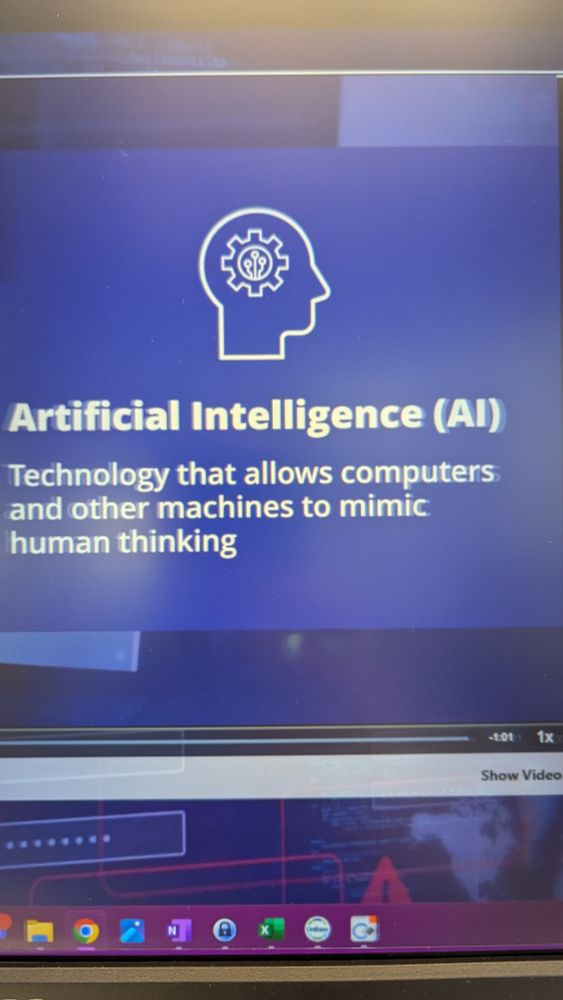 A screenshot of a slide that states that AI is technology that allows computers and other machines to mimic human thinking.
