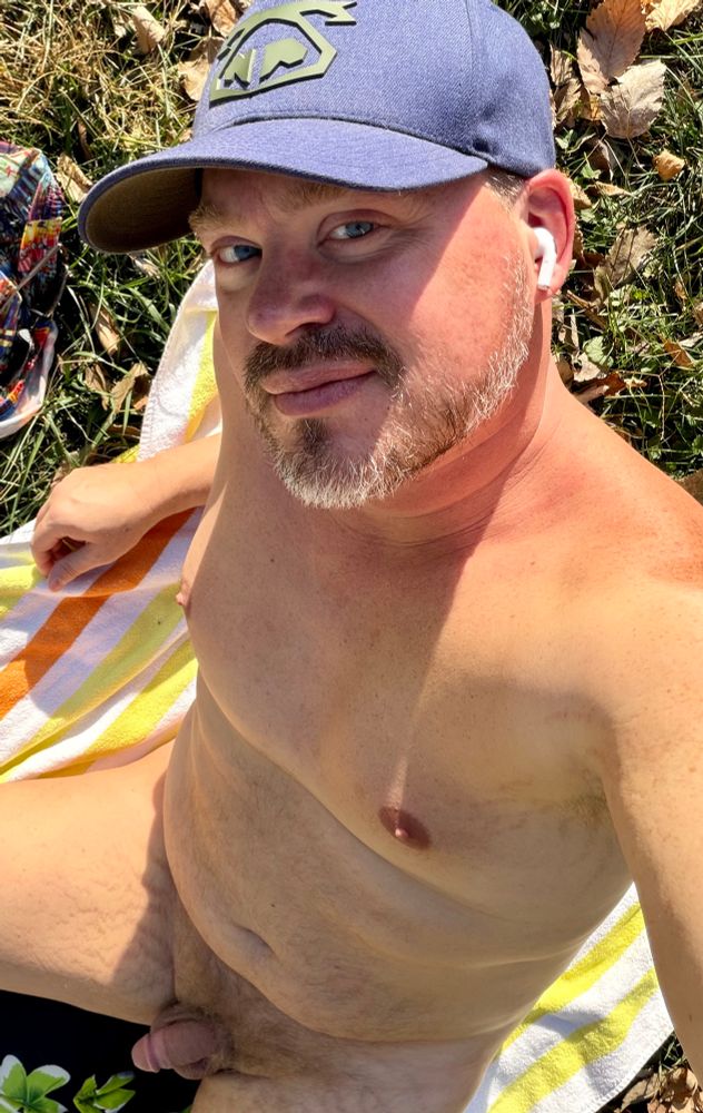 Selfie of myself, sitting nude towel in my backyard. 