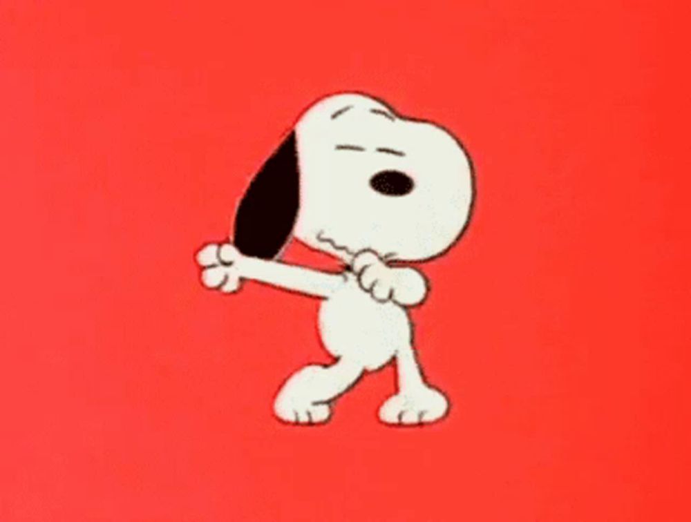 snoopy is dancing with his arms outstretched in front of a red background .