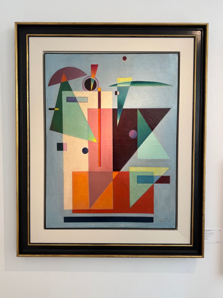 Framed geometric painting by Boris Kleint featuring overlapping triangles and blocks of purple, black, and teal.