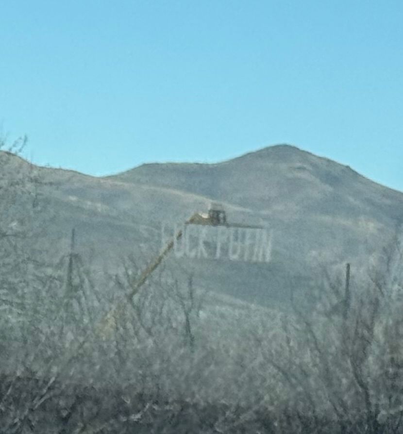A “Fuck Putin” sign was posted up by a rural desert highway in Arizona.