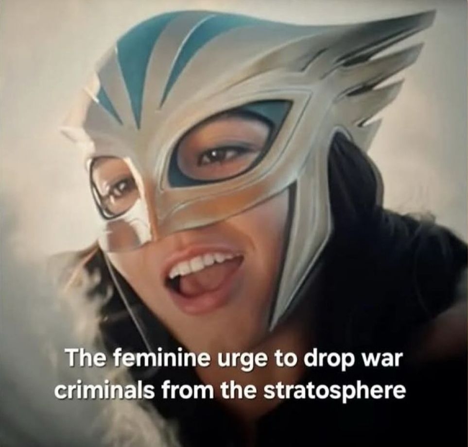 A Scene from Superman depicting Hawkgirl about to drop genocidal dictator Ghurkos with a caption that reads "The feminine urge to drop war criminals from the stratosphere" 