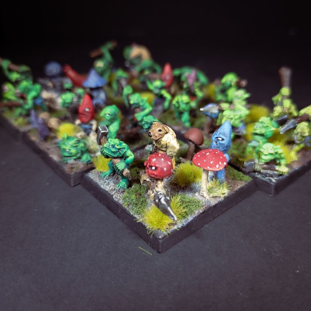 showing some mushrooms and a mushroom man holding a spear and a dog monk a bit better