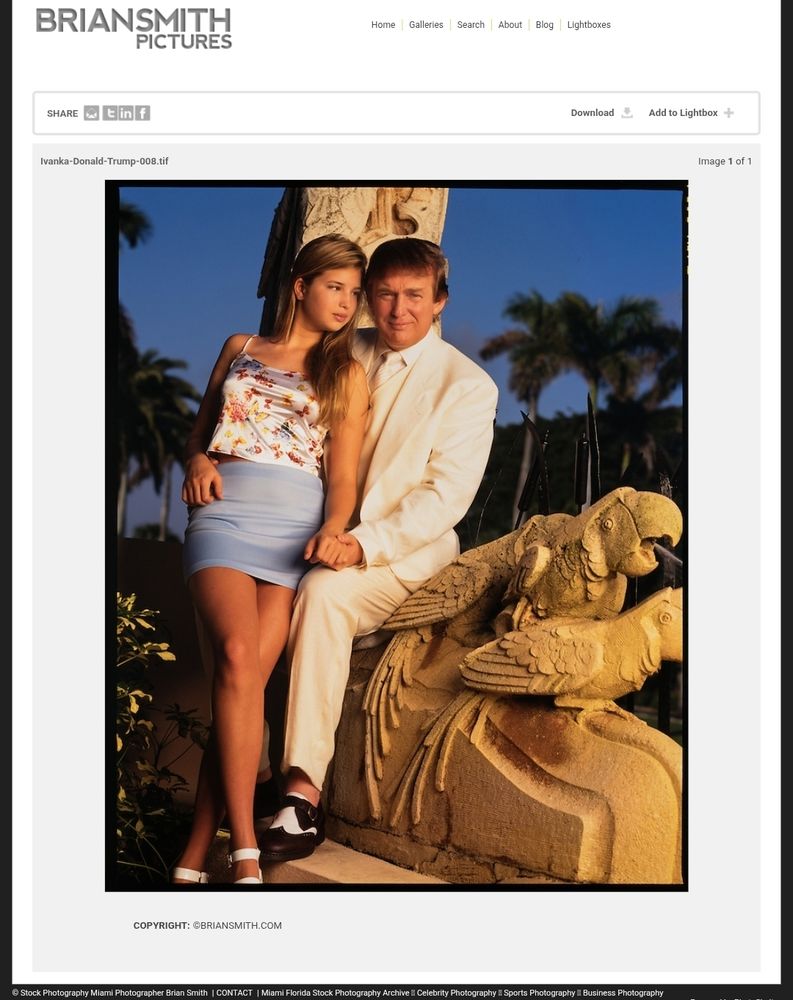 Professsional posed shot of smiling Donald Trump, in white suit, holding hands with 13 year old daughter Ivanka, in mini skirt and silk vest top, sat on his knee and gazing at him, next to sculpture of open-mouthed parrot mounting another parrot 