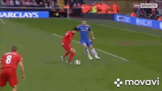Luis Suarez biting an opposing defender like a mad eejit 
