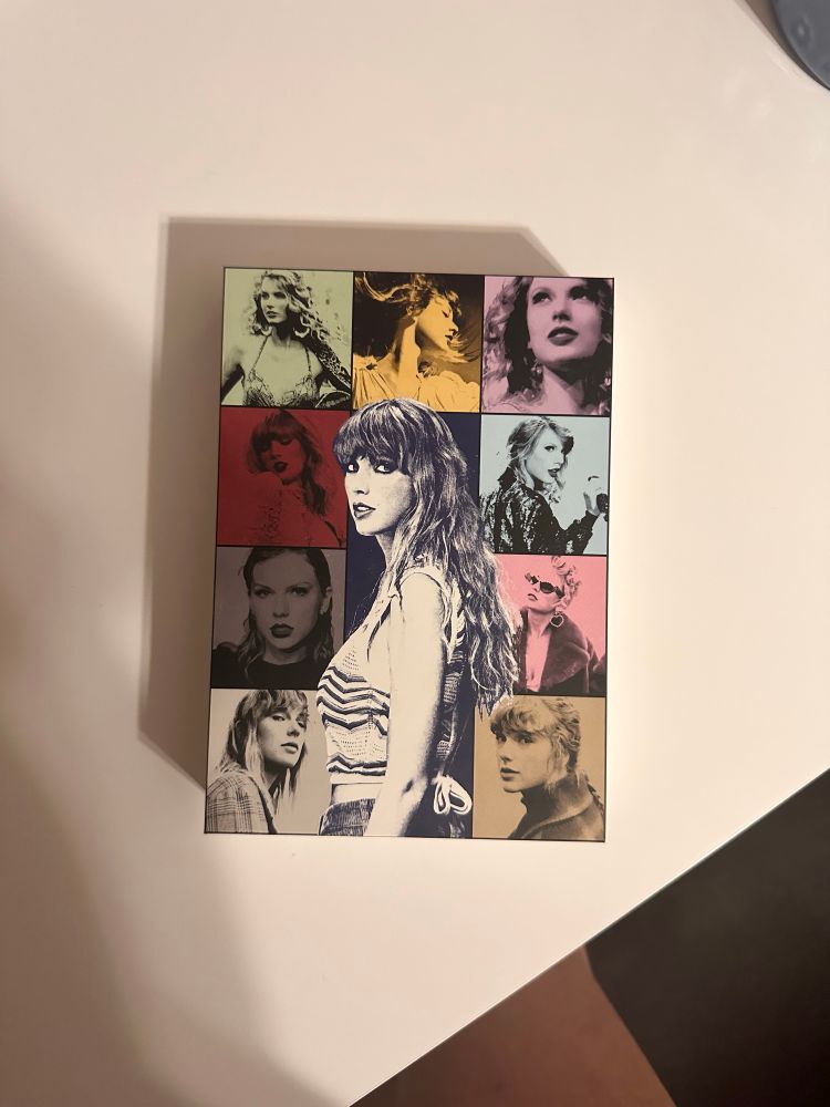 the eras tour box on a white table