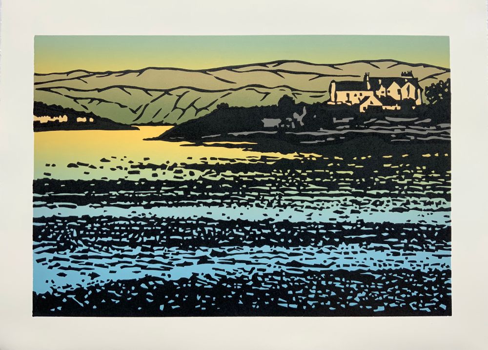 A colour, multi-block print of a beach at low tide with hills in the distance. The sunset is reflected in the water. 