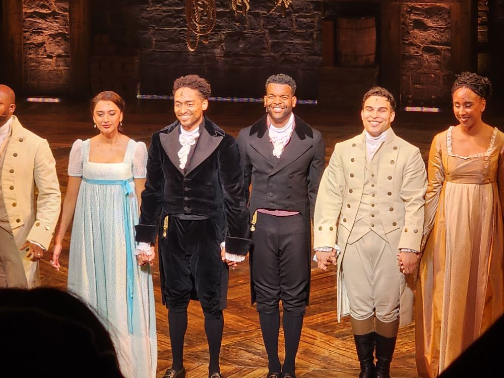 Washington; Eliza; Hamilton; Aaron Burr, sir; Lawrence;& Angelica on stage in London at the curtain call.