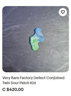 an ebay listing that states "Factory Defect Conjoined Twin Sour Patch Kid" for 420 CAN dollars.