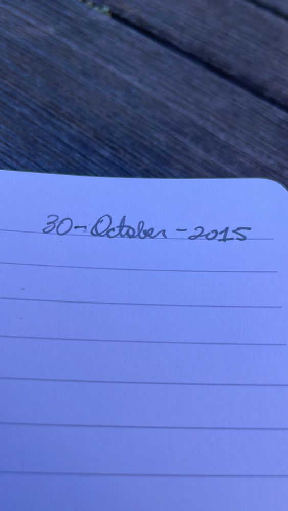 Picture of the incorrect date written on a notebook.