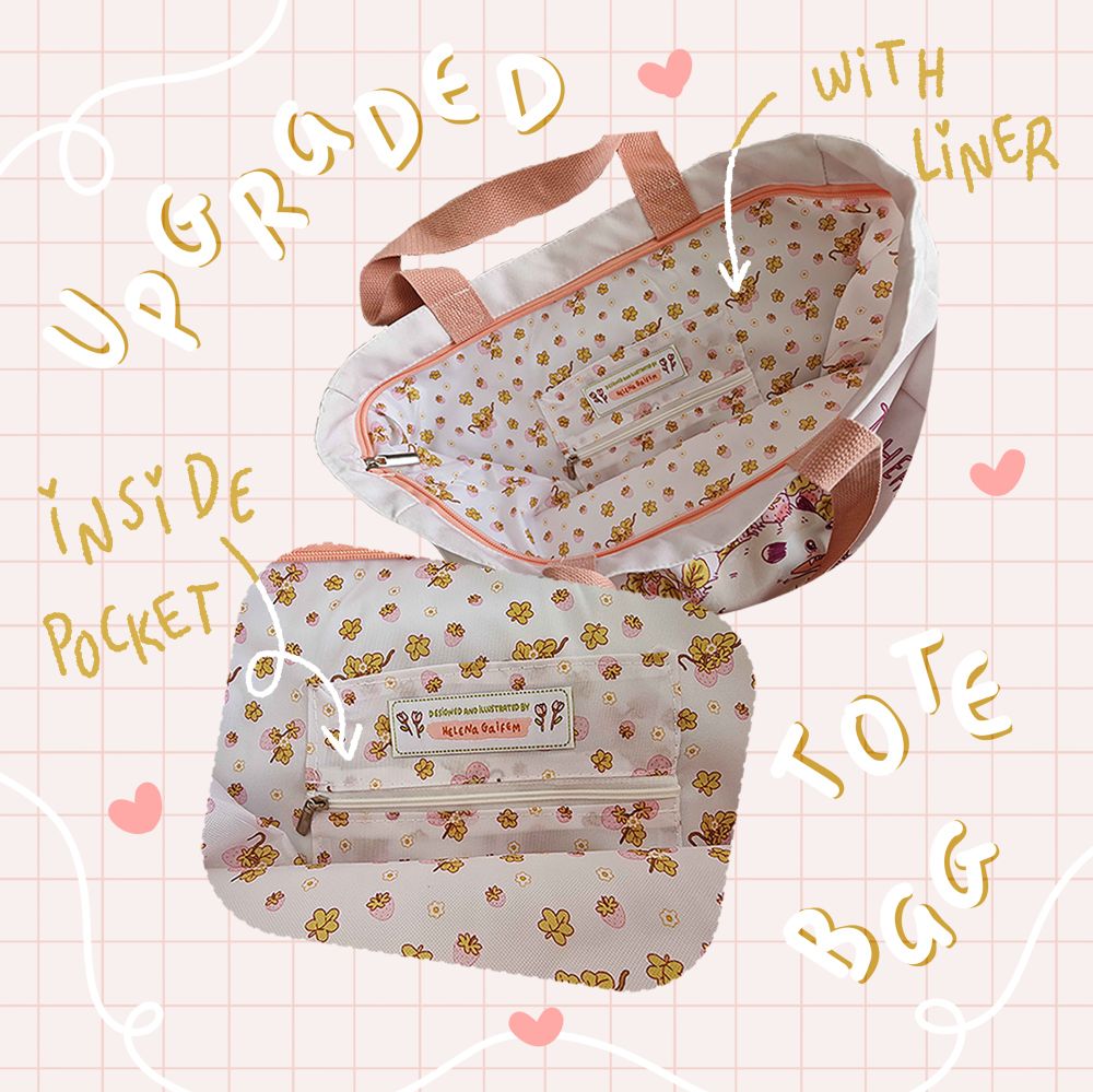 Picture depicting the inside of the tote bag. It shows the inside liner with a strawberry pattern and an inside pocket