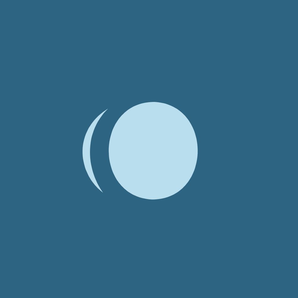 The image displays a circle-shaped symbol. A curved half moon-shaped symbol is positioned to the left of the circle, wrapping around its convex.