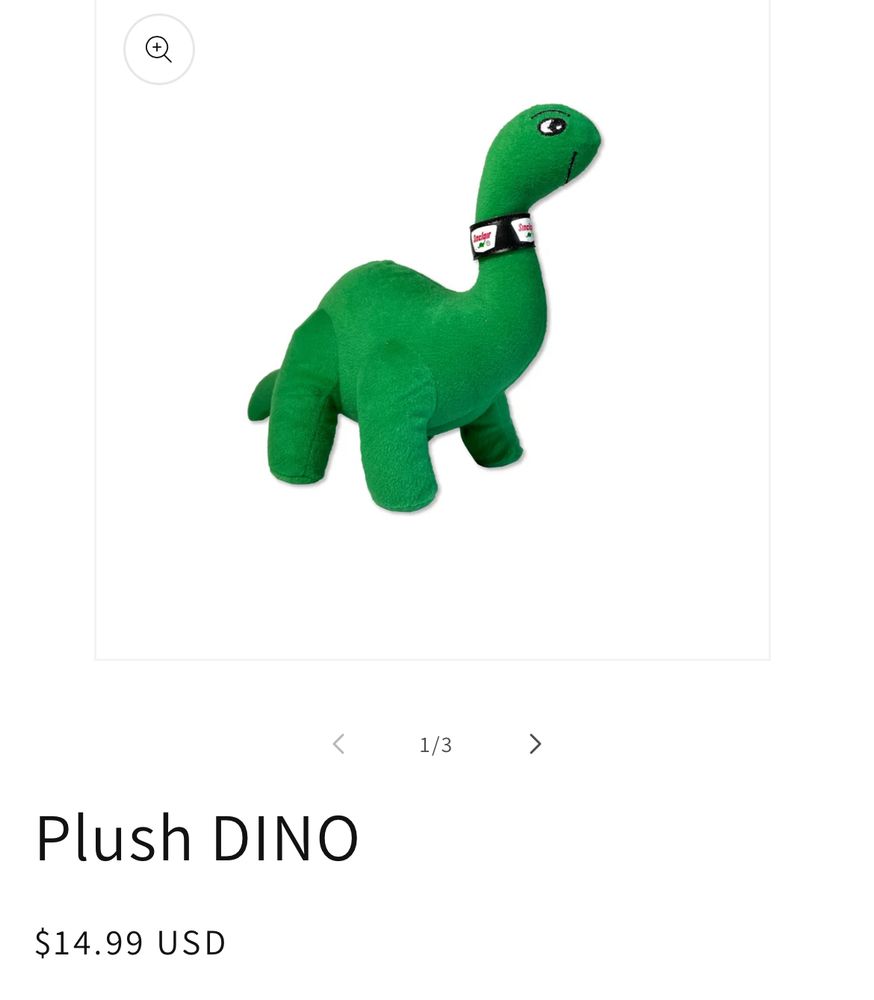Green plush dinosaur, the mascot of Sinclair Oil. 