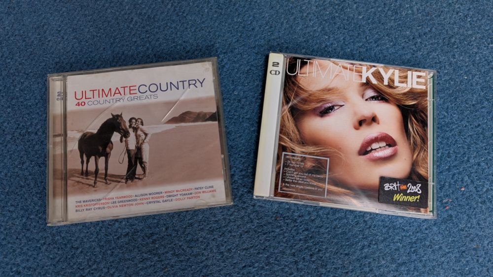 CDs of Ultimate Country and Ultimate Kylie 