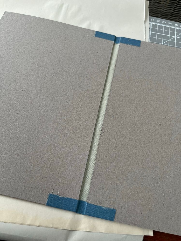 Spacer removed and the ends of the cloth folded over to the inside.