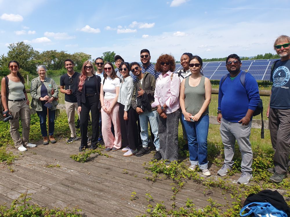 Group of Energy & Climate MSc students visiting a solar farm.