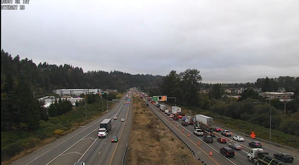 A camera image showing northbound SR 167 where the two left lanes are closed after a bridge strike near Pacific / Algona. 
