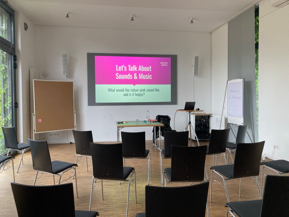 Chairs lined up for ‘Let’s Talk About Sounds & Music - what would the colour pink sound like and is it happy? ‘