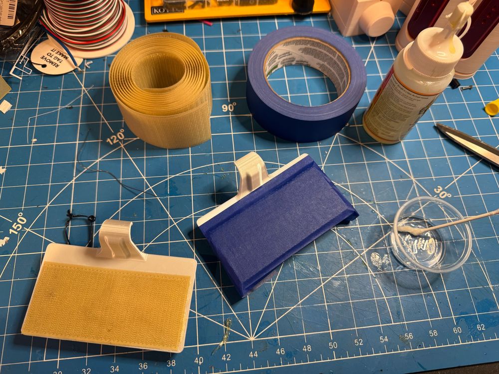 Gluing Velcro to the stocking hanger print.