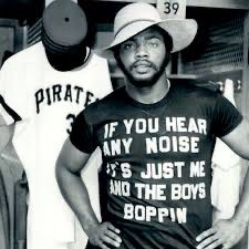 Dave Parker wearing a granny gardening hat while in a shirt that says “if you hear any noise it’s just me and the boys boppin”