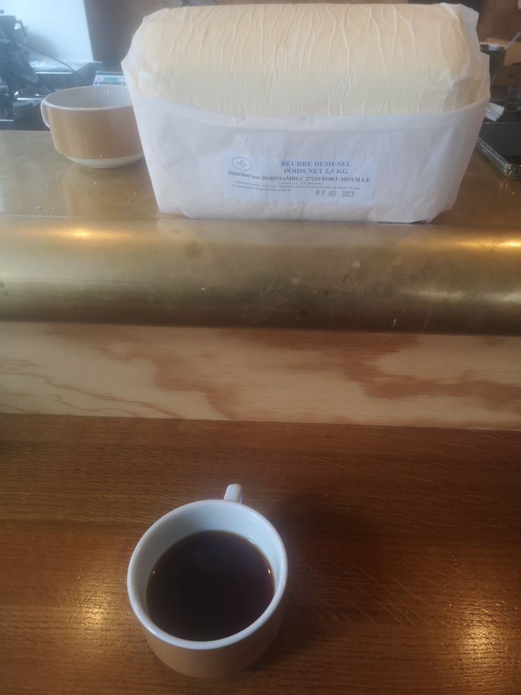Morning filter coffee on a gorgeous wooden countertop, and a little bit of butter (5 pounds) 