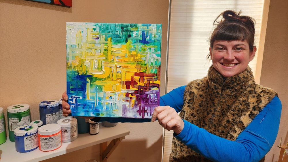 Lots of bright colors smashed together in a wet looking basket weave of vibrancy!