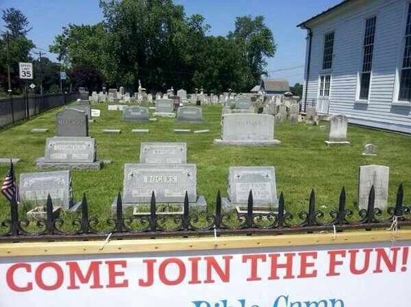 picture of a graveyard and a banner in front of it that says “come join the fun!” in all caps 