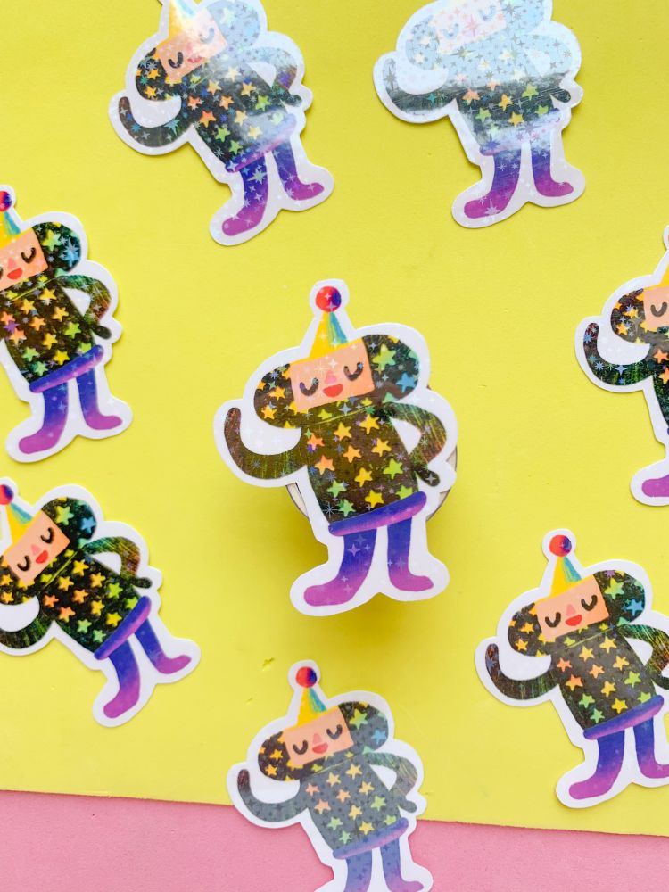 Holographic sticker of the disco cousin from katamari damacy. 