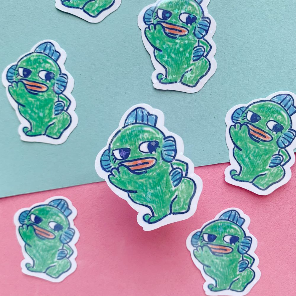 Holographic sticker of a cute fish sticking his butt out. 