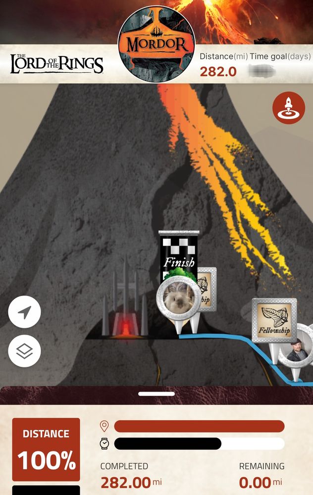 Screen cap of an image of Mount Doom, with an avatar of small fuzzy bunny at its gate. At the bottom is a Distance 100% completed: 282 miles for this leg.