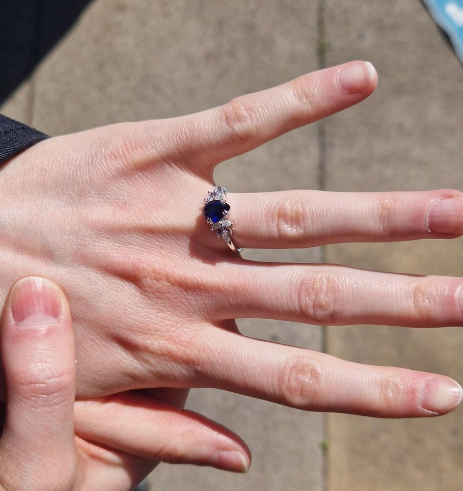 Scyphos hand with an engagement ring on the left hand