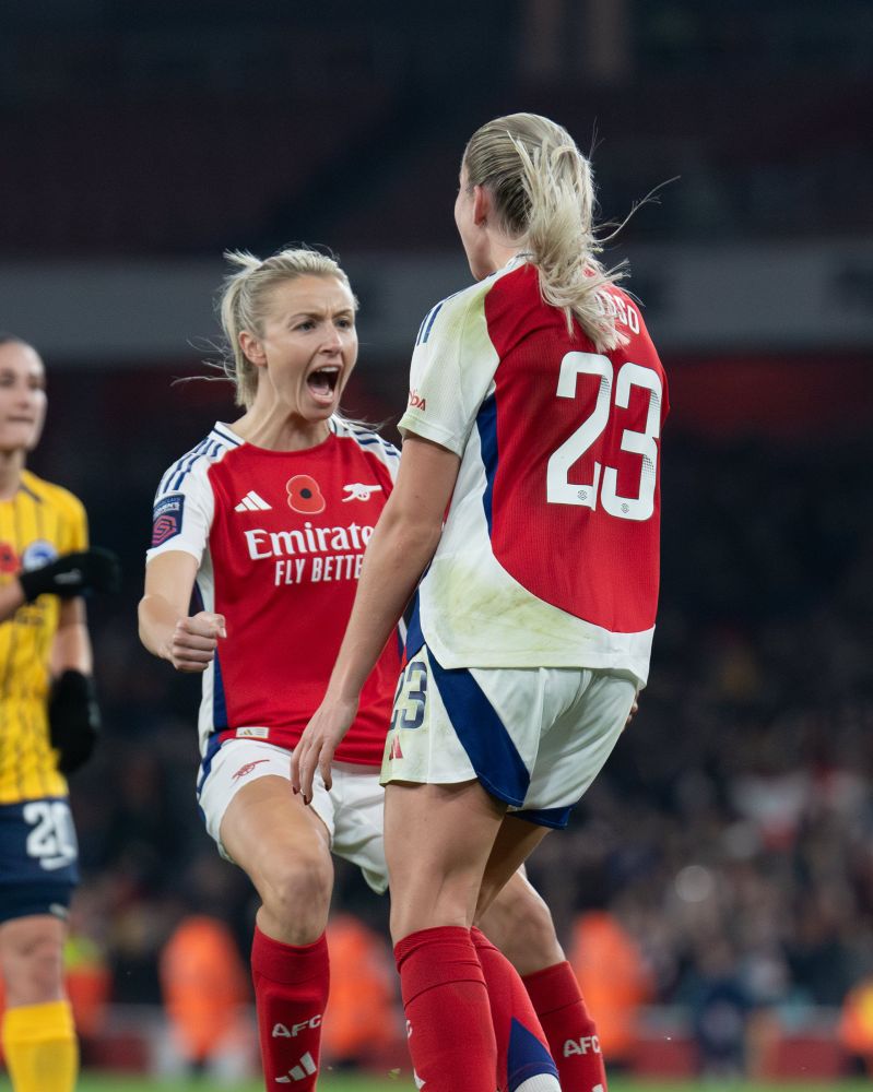 Leah Williamson celebrating after Alessia Russo scoring a penalty.