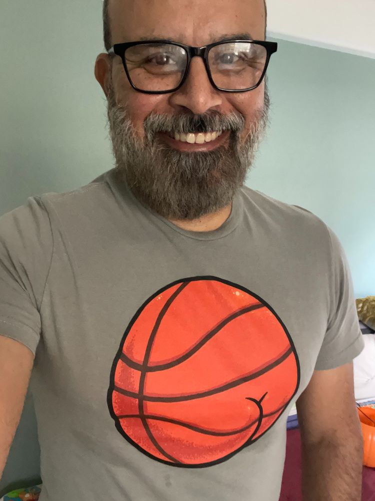 basketball with buttcheeks on a shirt