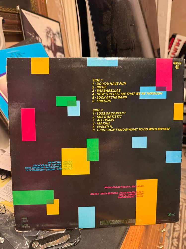 Back cover song list/credits