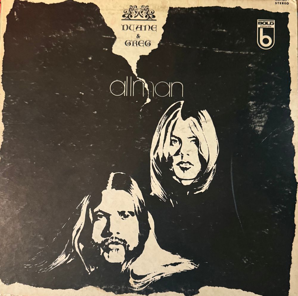 Front cover picture of greg and duane
Title