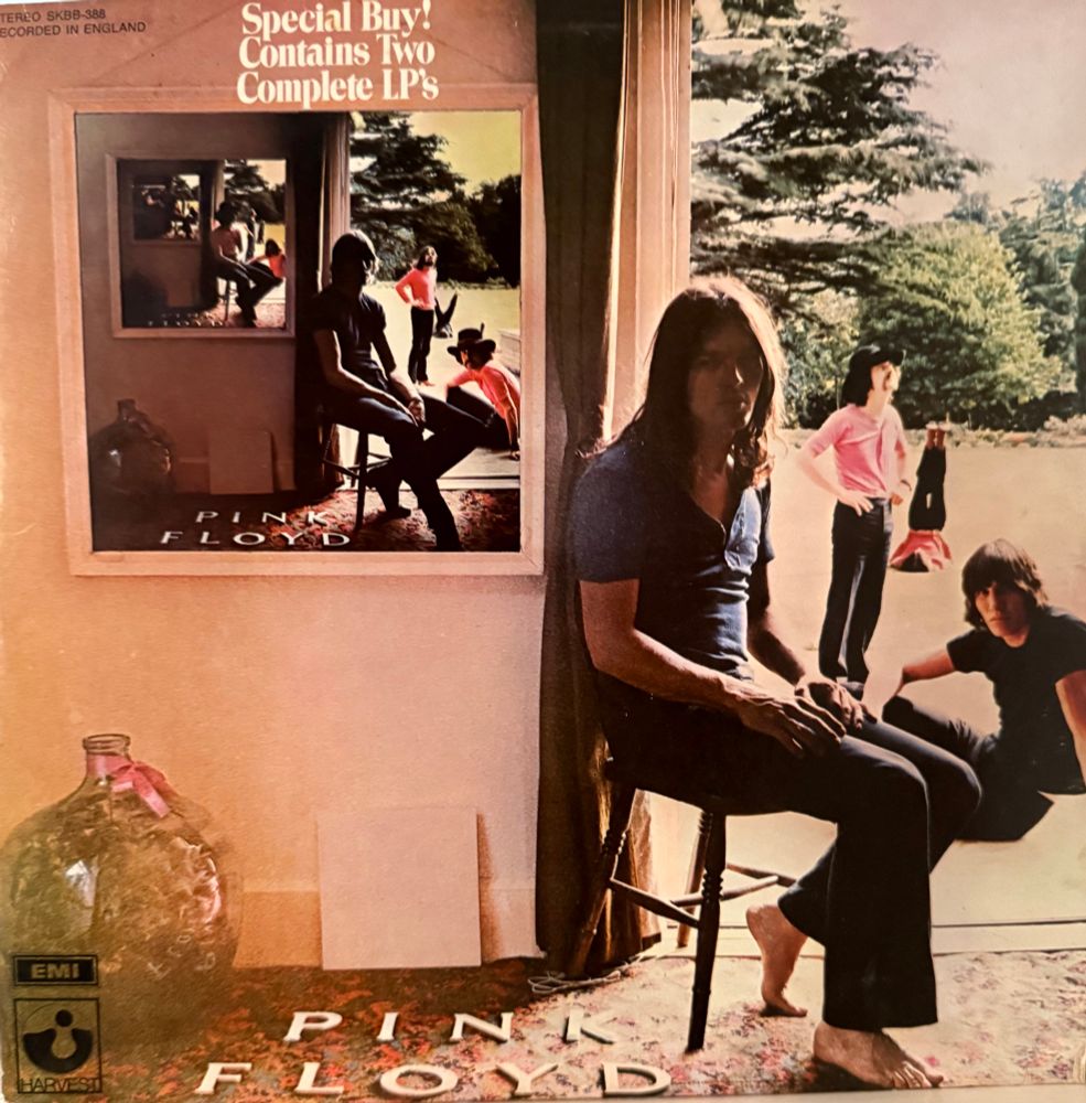 Front cover picture of band and an infinite mirror
