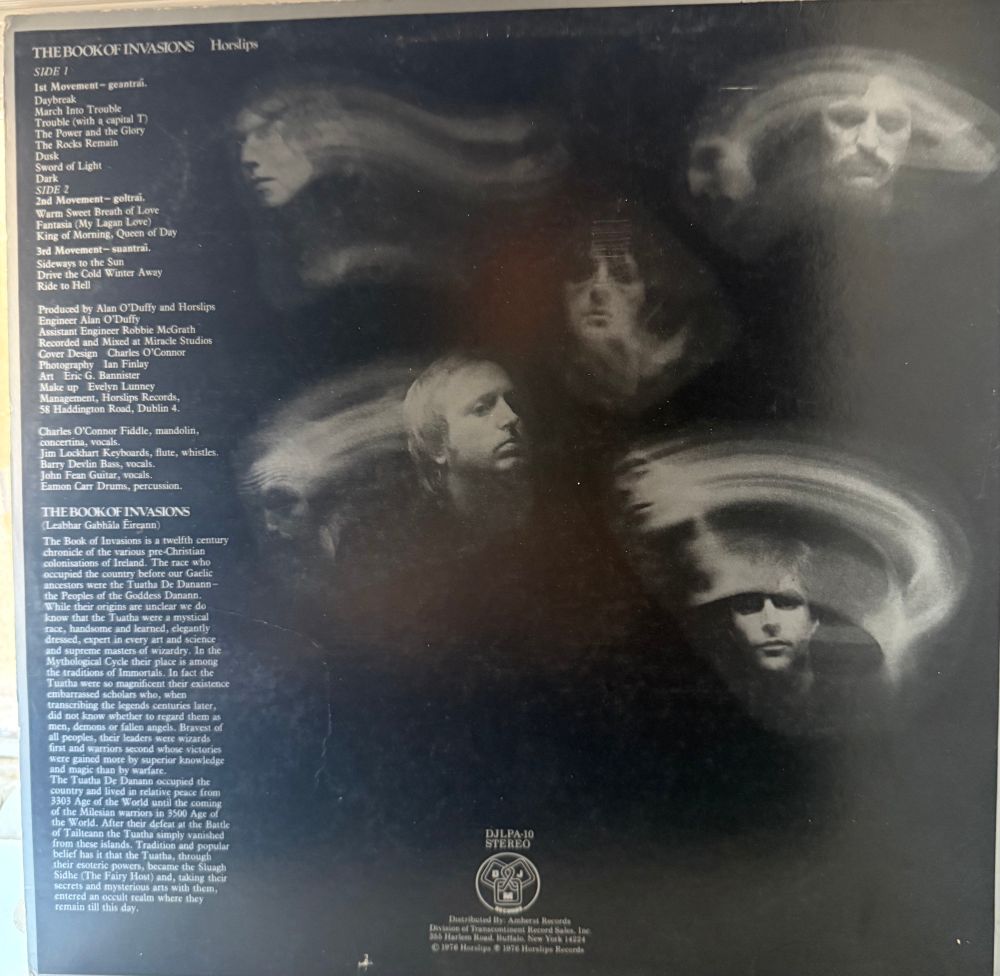 Back cover song list credits  and swirlu headhots of band members 