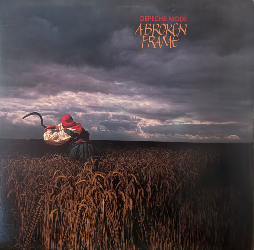 Front cover a reaper in a field of wheat
Name if band title