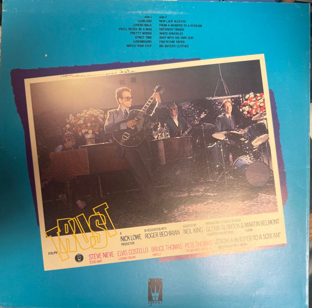 Back cover pic of band 
Song list