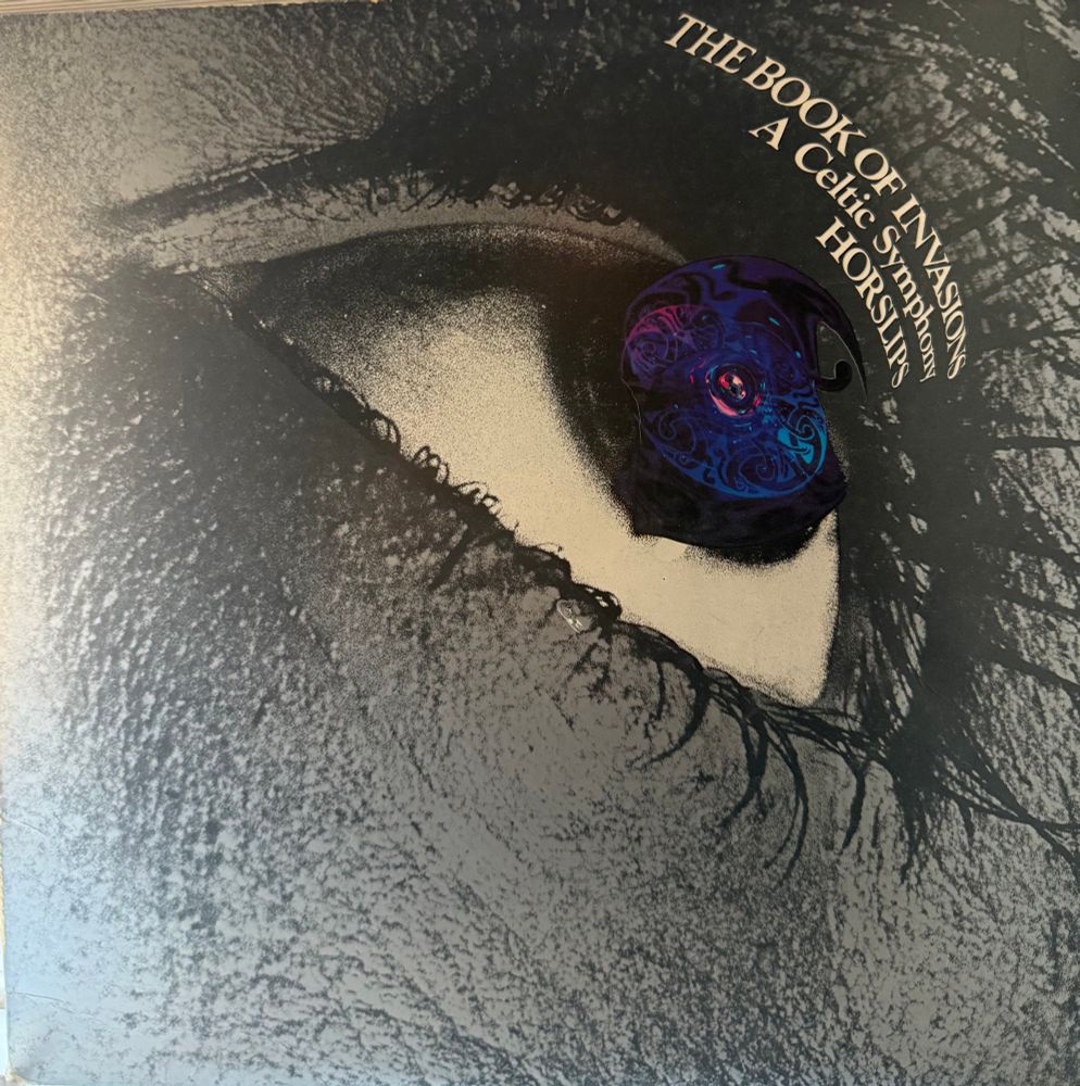 Front cover an eye with title and band name