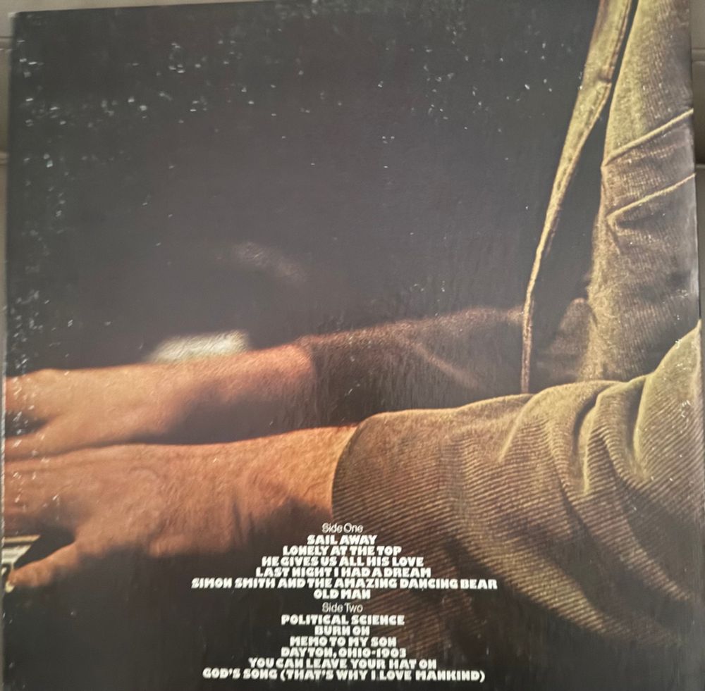 Back cover lower half of frint hands on keyboard song list