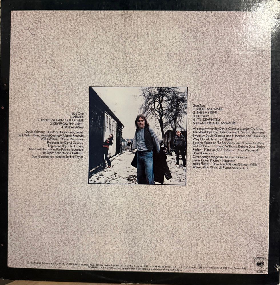 Back cover another photo song list/creditd